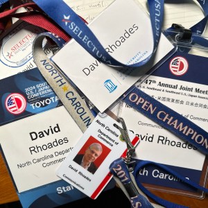 Trade show badges including two from the Southeast U.S./Japan Conference